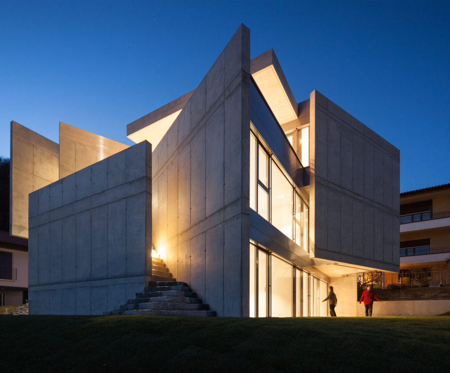 Modern villa during night. Light are on. Nobody inside