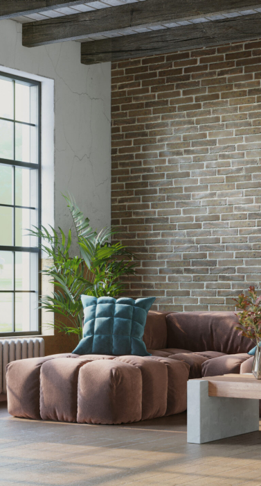 Grungy interior with brick wall and comfortable sofa, industrial